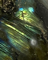 Labradorite sphere in acrylic stand